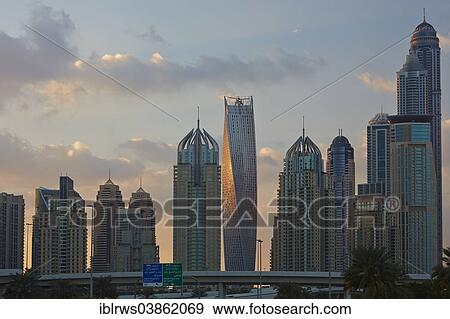 "Skyline with Cayan Tower at the center, Dubai Marina, Dubai, Emirate of Dubai, United Arab Emirates, Asia" View Large Photo Image Stock Photo - "Skyline with Cayan Tower at the center, Dubai Marina, Dubai, Emirate of Dubai, United Arab Emirates, Asia". Fotosearch