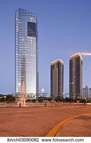 Stock Image - "Skyscraper Torre Repsol YPF, left, skyscrapers Torres River View, right, at the crossroads of Macacha Guemes - Juana Manso, Buenos Aires, Buenos Aires Province, Argentina, South America". Fotosearch