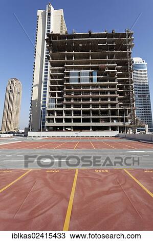 Skyscraper under construction, stopped construction project, Jumeirah Lake Towers, Dubai, United Arab Emirates, Middle East, Asia View Large Photo Image Stock Image - Skyscraper under construction, stopped construction project, Jumeirah Lake Towers, Dubai, United Arab Emirates, Middle East, Asia. Fotosearch