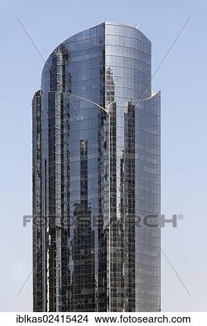 Skyscraper with a mirrored facade, large scale construction project, Jumeirah Lake Towers, Dubai, United Arab Emirates, Middle East, Asia View Large Photo Image Picture - Skyscraper with a mirrored facade, large scale construction project, Jumeirah Lake Towers, Dubai, United Arab Emirates, Middle East, Asia. Fotosearch