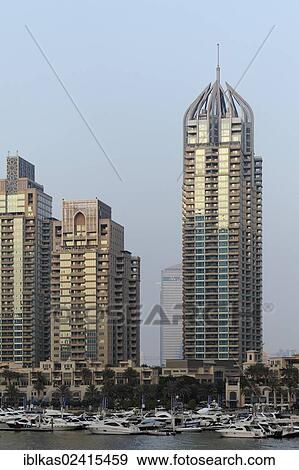 Skyscrapers and a marina, Dubai Marina district, Dubai, United Arab Emirates, Middle East, Asia View Large Photo Image Stock Photo - Skyscrapers and a marina, Dubai Marina district, Dubai, United Arab Emirates, Middle East, Asia. Fotosearch