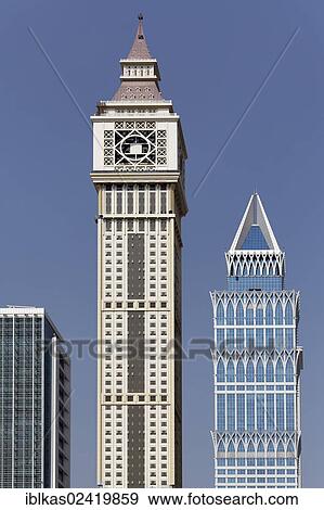 Skyscrapers built in differing architectural styles, Dubai International Financial Centre, DIFC, Dubai, United Arab Emirates, Middle East, Asia View Large Photo Image Stock Photo - Skyscrapers built in differing architectural styles, Dubai International Financial Centre, DIFC, Dubai, United Arab Emirates, Middle East, Asia. Fotosearch