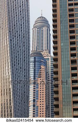 Skyscrapers close together, Dubai Marina district, Dubai, United Arab Emirates, Middle East, Asia View Large Photo Image Picture - Skyscrapers close together, Dubai Marina district, Dubai, United Arab Emirates, Middle East, Asia. Fotosearch