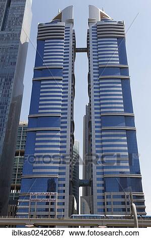 Skyscrapers, Emirates Grand Hotel, Sheikh Zayed Road, Dubai International Financial Centre, DIFC, Dubai, UAE, Middle East, Asia View Large Photo Image Stock Photo - Skyscrapers, Emirates Grand Hotel, Sheikh Zayed Road, Dubai International Financial Centre, DIFC, Dubai, UAE, Middle East, Asia. Fotosearch