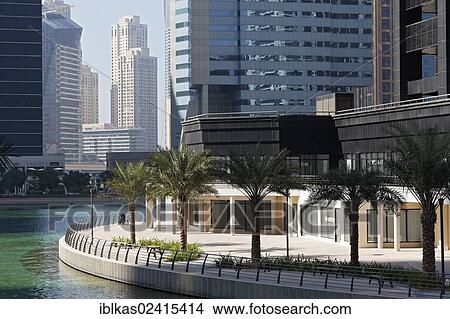 Skyscrapers on an artificial lake, large scale construction project, Jumeirah Lake Towers, Dubai, United Arab Emirates, Middle East, Asia View Large Photo Image Picture - Skyscrapers on an artificial lake, large scale construction project, Jumeirah Lake Towers, Dubai, United Arab Emirates, Middle East, Asia. Fotosearch