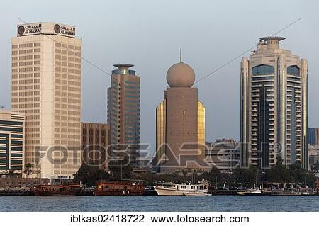 Skyscrapers on Dubai Creek, Etisalat and Al Masraf, Dubai, United Arab Emirates, Middle East, Asia View Large Photo Image Stock Image - Skyscrapers on Dubai Creek, Etisalat and Al Masraf, Dubai, United Arab Emirates, Middle East, Asia. Fotosearch
