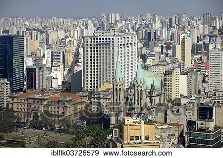 "Skyscrapers, sea of houses, Cathedral da Se and Praca da Se square at front, Sao Paulo, Sao Paulo, Brazil, South America" View Large Photo Image Stock Photo - "Skyscrapers, sea of houses, Cathedral da Se and Praca da Se square at front, Sao Paulo, Sao Paulo, Brazil, South America". Fotosearch