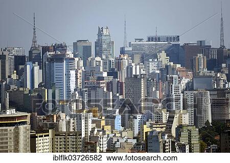 Stock Image - "Skyscrapers, sea of houses, Sao Paulo, Sao Paulo, Brazil, South America". Fotosearch