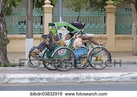 "Sleeping cyclo drivers, Phnom Penh, Cambodia, Asia" View Large Photo Image Stock Photo - "Sleeping cyclo drivers, Phnom Penh, Cambodia, Asia". Fotosearch