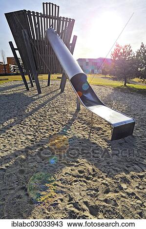 "Slide on a playground, back lit, Hasenbergl, Munich, Upper Bavaria, Bavaria, Germany, Europe" View Large Photo Image Stock Image - "Slide on a playground, back lit, Hasenbergl, Munich, Upper Bavaria, Bavaria, Germany, Europe". Fotosearch