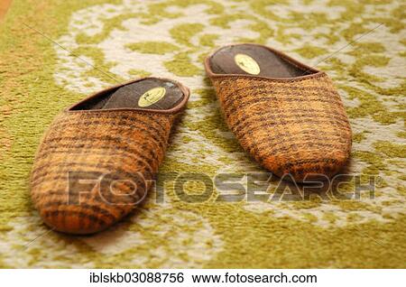 Slippers on carpet View Large Photo Image Stock Photograph - Slippers on carpet. Fotosearch
