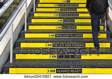 Stock Image - "Slogans on stairs, Photokina 2012, Cologne, North Rhine-Westphalia, Germany, Europe". Fotosearch
