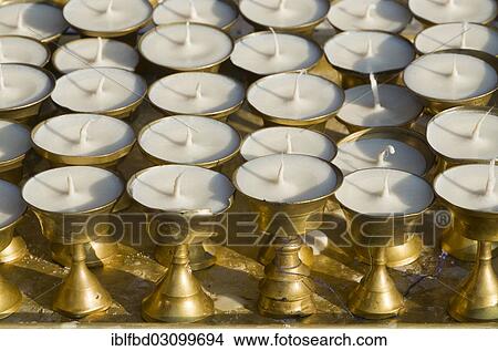 "Small butterlamps for sale as offerings, Kathmandu, Kathmandu District, Bagmati Zone, Nepal, Asia" View Large Photo Image Picture - "Small butterlamps for sale as offerings, Kathmandu, Kathmandu District, Bagmati Zone, Nepal, Asia". Fotosearch