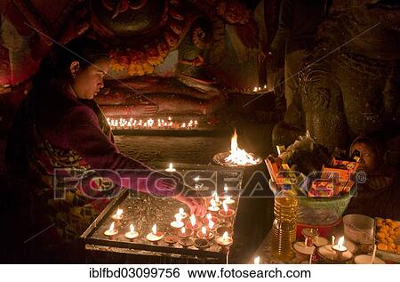 "Small butterlamps, for sale as offerings, lighted at night, Kathmandu, Kathmandu District, Bagmati Zone, Nepal, Asia" View Large Photo Image Stock Photograph - "Small butterlamps, for sale as offerings, lighted at night, Kathmandu, Kathmandu District, Bagmati Zone, Nepal, Asia". Fotosearch