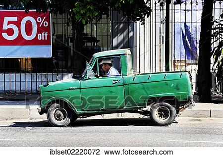 "Small car and a sign, lettering 50% off, Yangon, Burma also known as Myanmar, Southeast Asia, Asia" View Large Photo Image Stock Image - "Small car and a sign, lettering 50% off, Yangon, Burma also known as Myanmar, Southeast Asia, Asia". Fotosearch