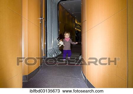 Stock Image - "Small child walking inside ICE train, Dresden, Saxony, Germany, Europe". Fotosearch