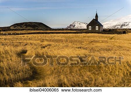 Stock Photography - "Small church in the Icelandic countryside, with moonlight, Snaefellsnes Peninsula, Iceland, Europe". Fotosearch