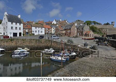 Stock Photo - "Small fishing boats in the harbour of Crail, Fife peninsula, Scotland, United Kingdom, Europe". Fotosearch
