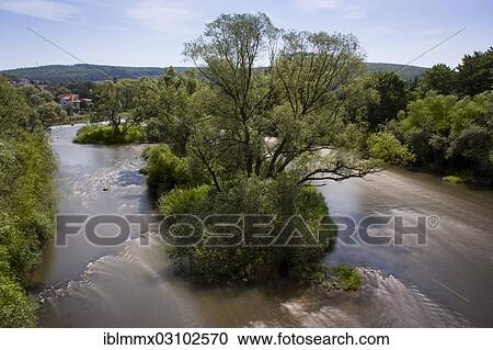 "Small island in a branch of the Fulda River, Hannoversch Munden, Lower Saxony, Germany, Europe" View Large Photo Image Stock Image - "Small island in a branch of the Fulda River, Hannoversch Munden, Lower Saxony, Germany, Europe". Fotosearch