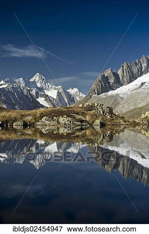 "Small lake above the Aletsch Glacier and the Bernese Oberland, UNESCO World Heritage Site, Bettmeralp, Valais, Switzerland, Europe" View Large Photo Image Stock Photo - "Small lake above the Aletsch Glacier and the Bernese Oberland, UNESCO World Heritage Site, Bettmeralp, Valais, Switzerland, Europe". Fotosearch