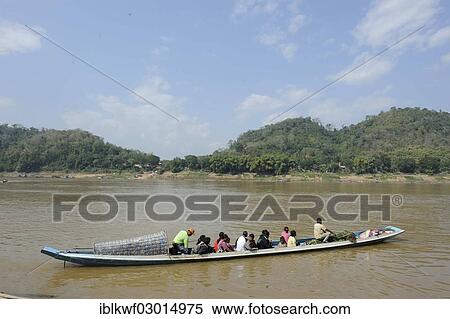 "Small passenger ferry with Laotians crossing the Mekong River, Mekong, Luang Prabang, Luang Prabang Province, Laos, Asia" View Large Photo Image Stock Photography - "Small passenger ferry with Laotians crossing the Mekong River, Mekong, Luang Prabang, Luang Prabang Province, Laos, Asia". Fotosearch