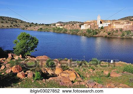 "Small village with a mosque and a reservoir, Tlata Uoanass, Souss-Massa-Draa, Antiatlas, Morocco, Africa" View Large Photo Image Stock Image - "Small village with a mosque and a reservoir, Tlata Uoanass, Souss-Massa-Draa, Antiatlas, Morocco, Africa". Fotosearch