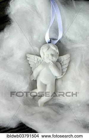 "Small white angel, decoration" View Large Photo Image Picture - "Small white angel, decoration". Fotosearch