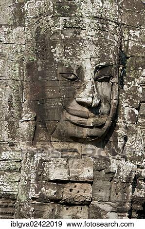 Stock Photo - Smile of Angkor, huge face carved in stone on a tower, Bayon Temple, Angkor Thom, Siem Reap, Cambodia, Southeast Asia, Asia. Fotosearch