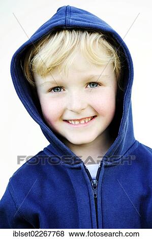 Stock Photo - "Smiling 5-year-old boy wearing a hoodie jacket, portrait". Fotosearch