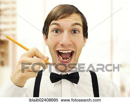 "Smiling accountant, clerk at the office, hollding a pencil, portrait" View Large Photo Image Stock Photography - "Smiling accountant, clerk at the office, hollding a pencil, portrait". Fotosearch