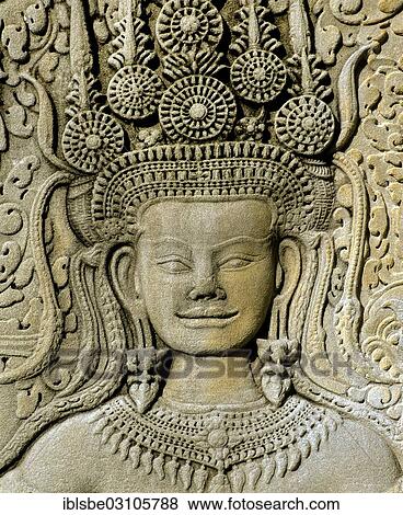 Stock Photo - "Smiling apsara dancer, sandstone relief in the temple of Angkor Wat, UNESCO World Cultural Heritage Site, Siem Reap, Siem Reap Province, Cambodia, Asia". Fotosearch