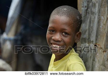 "Smiling boy, Camp Icare for earthquake refugees, Fort National, Port-au-Prince, Haiti, North America" View Large Photo Image Stock Image - "Smiling boy, Camp Icare for earthquake refugees, Fort National, Port-au-Prince, Haiti, North America". Fotosearch