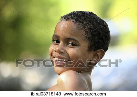"Smiling boy with wet hair, Riezlern, Vorarlberg, Austria, Europe" View Large Photo Image Stock Photo - "Smiling boy with wet hair, Riezlern, Vorarlberg, Austria, Europe". Fotosearch