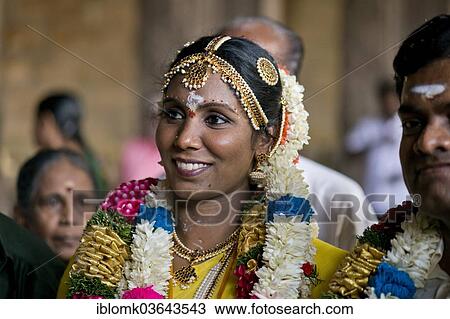 "Smiling bride in Meenakshi Amman Temple or Sri Meenakshi Sundareswarar Temple, Madurai, Tamil Nadu, India, Asia" View Large Photo Image Stock Image - "Smiling bride in Meenakshi Amman Temple or Sri Meenakshi Sundareswarar Temple, Madurai, Tamil Nadu, India, Asia". Fotosearch