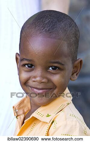 Stock Image - "Smiling creole boy, portrait, Mahe Island, Seychelles, Africa, Indian Ocean, Africa". Fotosearch
