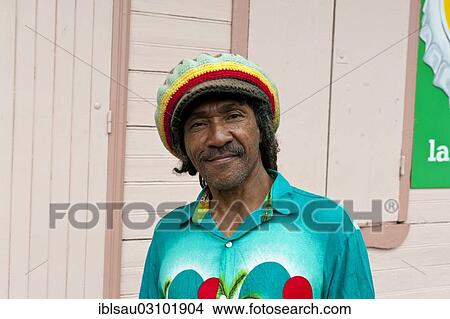 "Smiling Creole man with a colourful hat, Cirque de Salazie, Hell-Bourg, La Reunion, Reunion, France, Africa" View Large Photo Image Picture - "Smiling Creole man with a colourful hat, Cirque de Salazie, Hell-Bourg, La Reunion, Reunion, France, Africa". Fotosearch