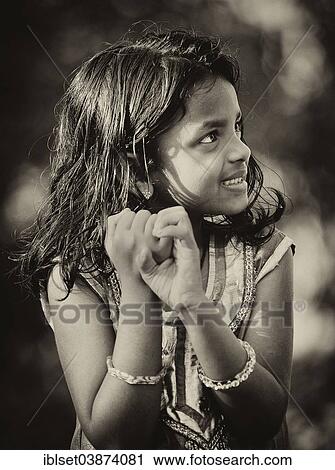 Stock Image - "Smiling girl, Kerala, South India, India, Asia". Fotosearch
