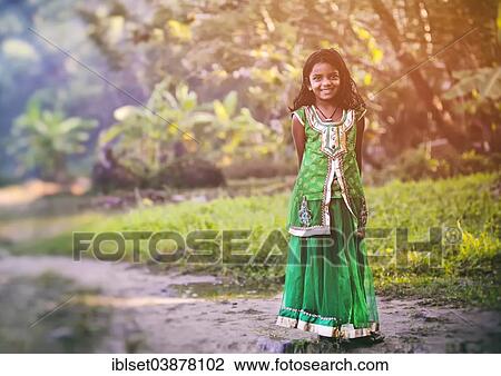 Stock Image - "Smiling girl, Kerala, South India, India, Asia". Fotosearch