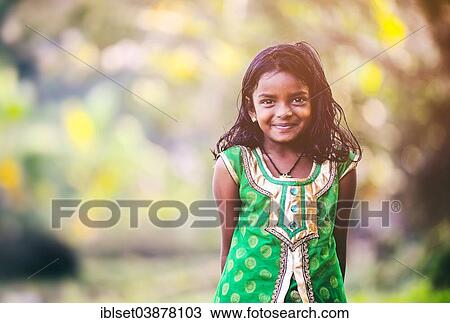 Stock Image - "Smiling girl, Kerala, South India, India, Asia". Fotosearch