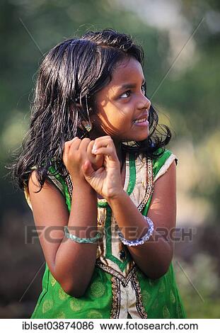 Stock Photograph - "Smiling girl, Kerala, South India, India, Asia". Fotosearch