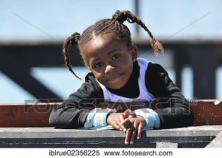 "Smiling girl, Luederitz Waterfront, Namibia, Africa" View Large Photo Image Stock Photography - "Smiling girl, Luederitz Waterfront, Namibia, Africa". Fotosearch
