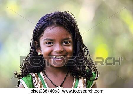 "Smiling girl, portrait, Kerala, South India, India, Asia" View Large Photo Image Stock Image - "Smiling girl, portrait, Kerala, South India, India, Asia". Fotosearch