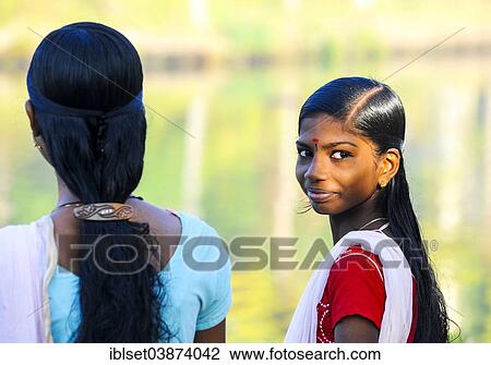 Stock Image - "Smiling girl with a bindi, Kerala, South India, India, Asia". Fotosearch