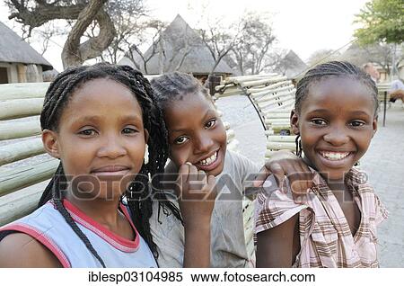 "Smiling girls in the Okaukuejo Camp, portrait, Etosha National Park, Okaukuejo, Namibia, Africa" View Large Photo Image Stock Photography - "Smiling girls in the Okaukuejo Camp, portrait, Etosha National Park, Okaukuejo, Namibia, Africa". Fotosearch