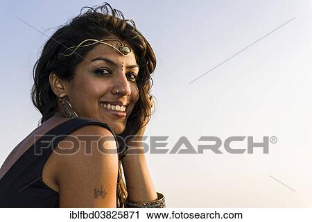 Stock Image - "Smiling Indian woman, portrait, Goa, India, Asia". Fotosearch