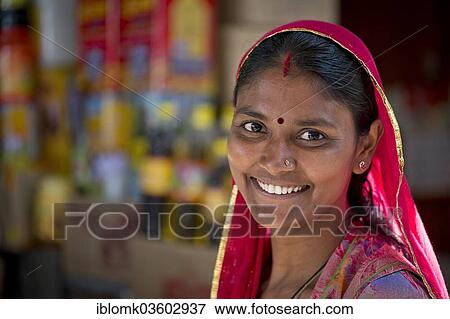 "Smiling Indian woman wearing a dupatta scarf with a bindi, portrait, Jodhpur, Rajasthan, India, Asia" View Large Photo Image Stock Photo - "Smiling Indian woman wearing a dupatta scarf with a bindi, portrait, Jodhpur, Rajasthan, India, Asia". Fotosearch