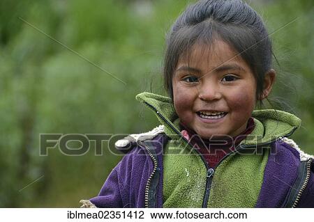 "Smiling Indio girl wearing traditional dress, near Cusco, Peru, Andes, South America" View Large Photo Image Stock Image - "Smiling Indio girl wearing traditional dress, near Cusco, Peru, Andes, South America". Fotosearch