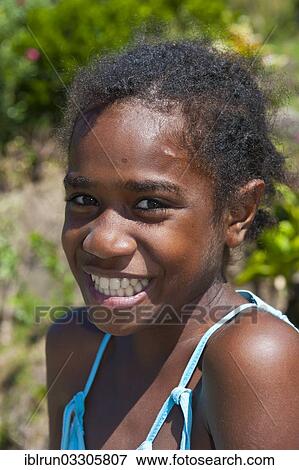 "Smiling local girl, portrait, Grande Terre, New Caledonia, France, Oceania" View Large Photo Image Stock Photo - "Smiling local girl, portrait, Grande Terre, New Caledonia, France, Oceania". Fotosearch