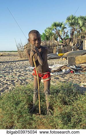 Picture - "Smiling Malagasy boy, Betany village, Morondava, Toliara province, Madagascar, Africa". Fotosearch
