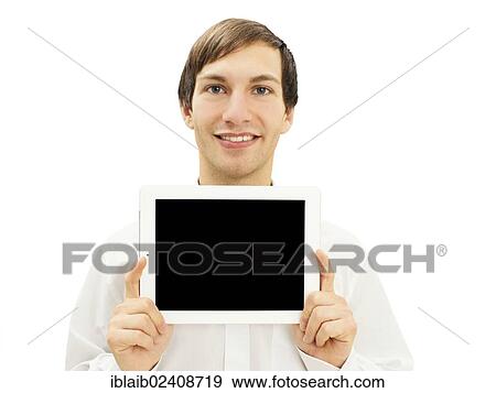 Smiling man holding an iPad View Large Photo Image Stock Photo - Smiling man holding an iPad. Fotosearch